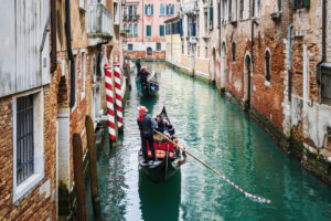 Gondolier, Canal, Venice, historic center, Veneto, Italy, northern Italy, Europe Gondolier, Canal, Venice, historic center, Veneto, Italy, northern Italy, Europe
